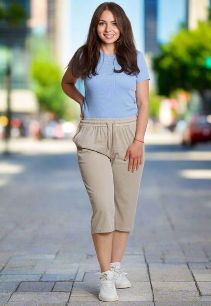 Бежов еластичен панталон с висока талия и връзки - Maxi Market