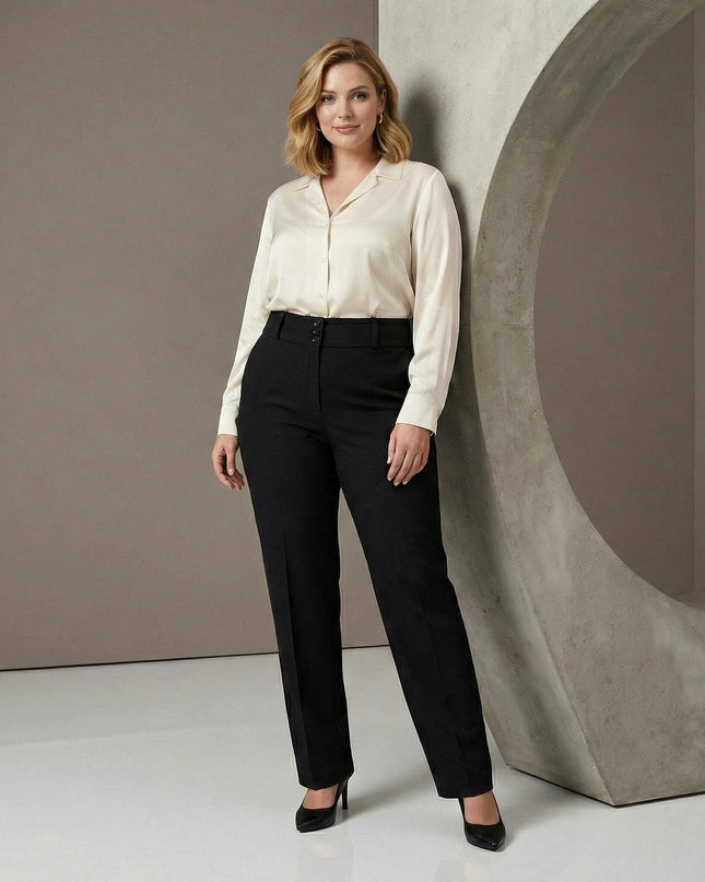 Черен официален дамски панталон с висока талия, декоративни копчета и класически ръб, сниман в цял ръст върху модел.