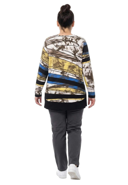 Дълга макси туника с абстрактен шарен принт и черен кант в долната част, представена върху модел в гръб.