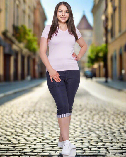 Pantaloni confortabili, de mărime mare, până la genunchi, cu buzunare