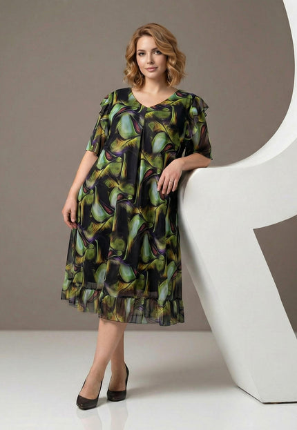 Официална шифонена рокля в пъстър десен с разкроена кройка