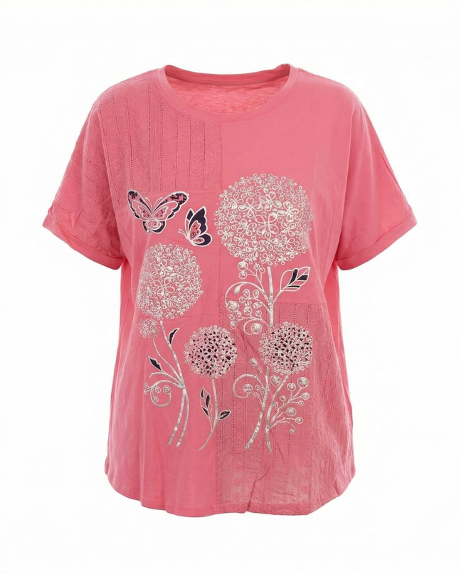 Лятна памучна туника в цвят корал с апликация на цветя и пеперуди, представена като плосък кадър на бял фон.
