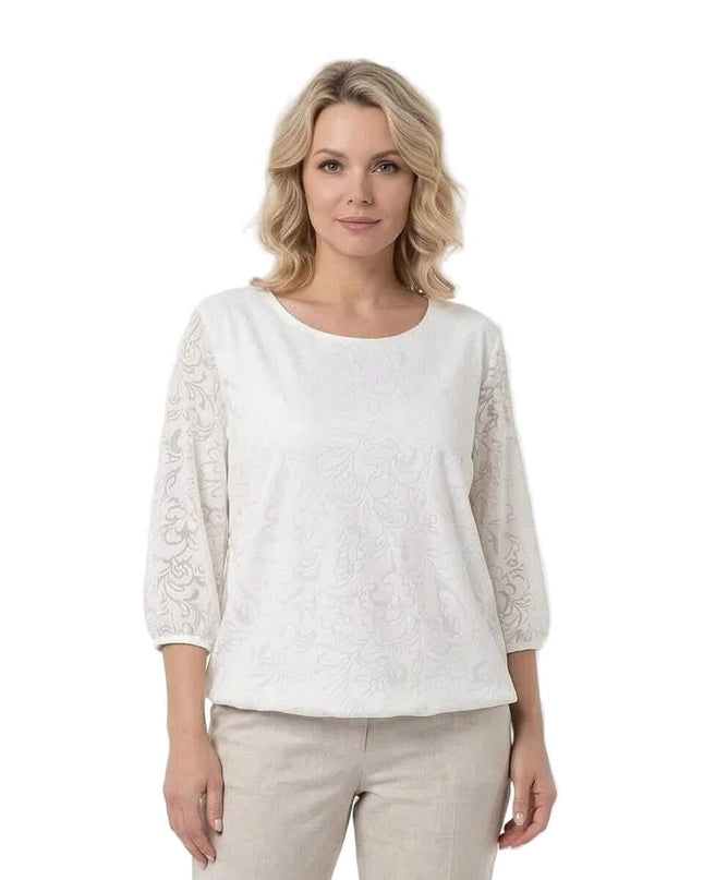 Официална бяла макси туника с ефирни 7/8 ръкави и релефен флорален десен. Изглед отпред върху модел, заснет на бял фон.