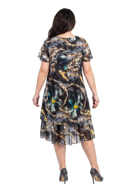 Изглед отзад на официална разкроена макси рокля от шифон с многоцветен принт и етажиран подгъв.