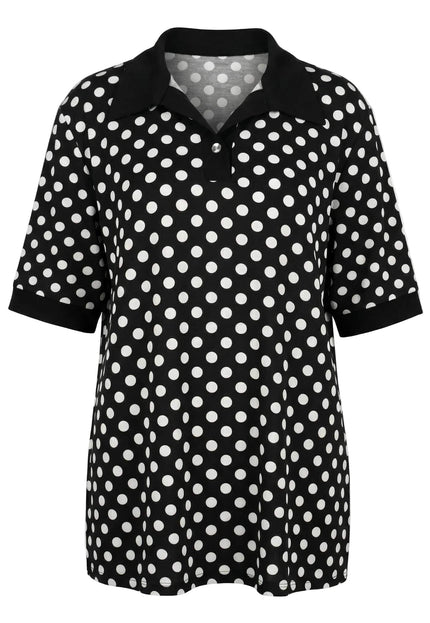 Черна макси туника на бели точки с черна яка и къси ръкави с маншети, заснета отпред на бял фон.