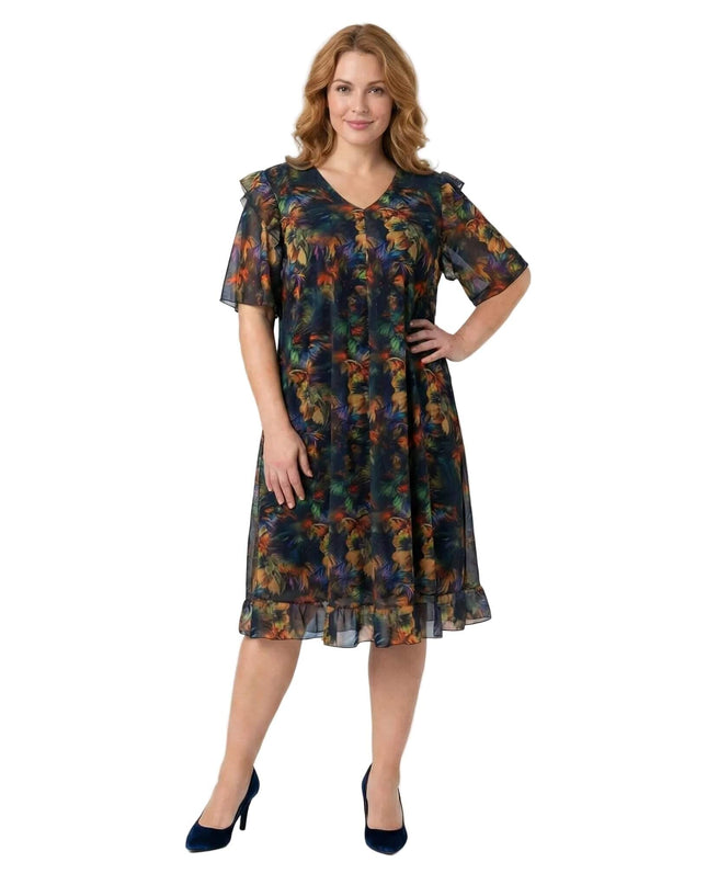 Официална макси рокля от цветен шифон с ефектен ръкав, тъмносиня основа с флорален принт и V-образно деколте, заснета в цял ръст отпред.