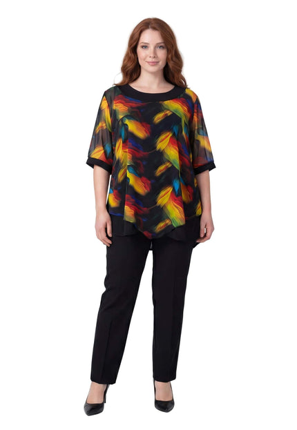 Официална макси туника с асиметричен пъстър шифон в черно, представена върху модел в цял ръст на бял фон.