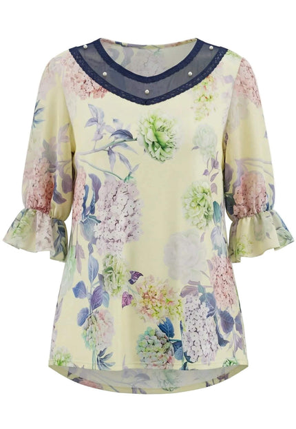 Официална разкроена макси туника в жълто с флорален принт и деколте с тъмносин тюл и перли, заснета отпред на бял фон.