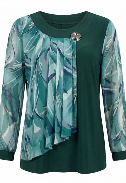 Елегантна макси туника в масленозелен цвят с ефирен флорален шифон и декоративна брошка, преден изглед на бял фон.