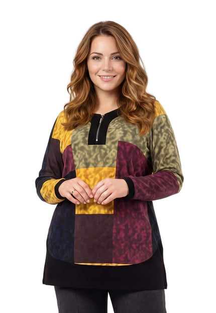 Официална шарена макси туника с цип и дълъг ръкав, отличаваща се с абстрактен пачуърк десен в топли тонове, заснета отпред.