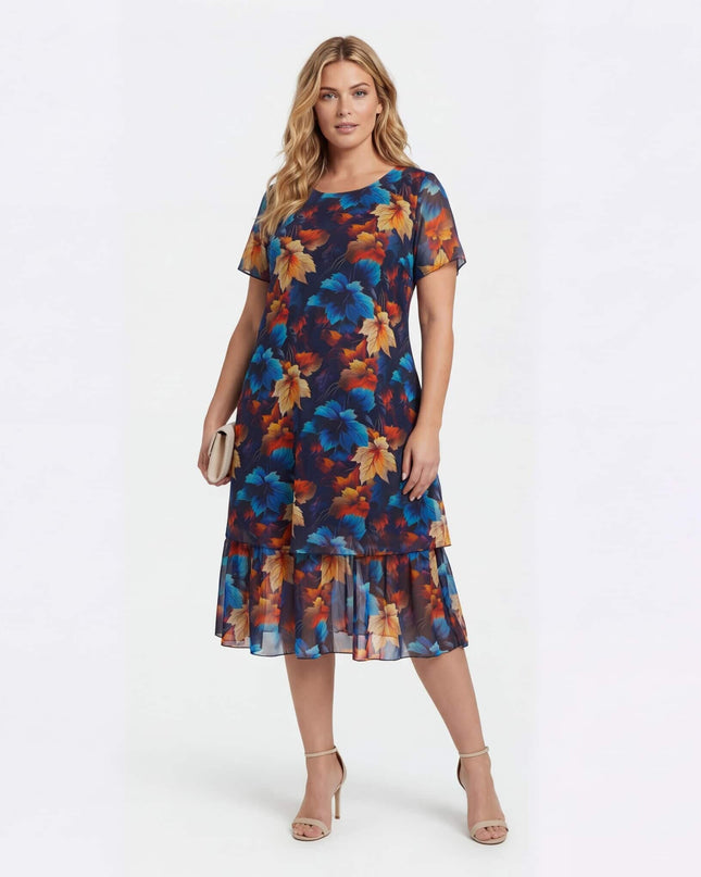 Официална тъмносиня макси рокля от шифон с многоцветен принт на листа, представена върху модел в цял ръст на бял фон.