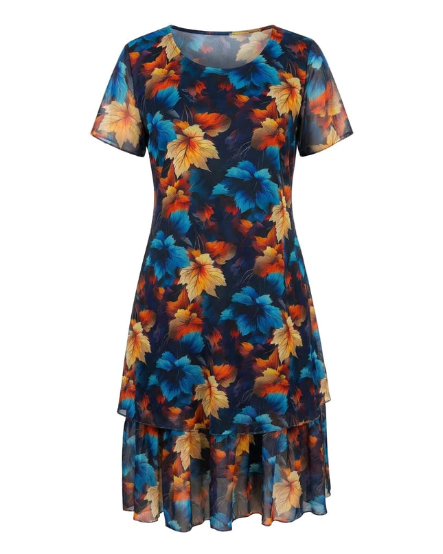 Тъмносиня макси рокля от шифон с живописен многоцветен принт на листа, заснета отпред на бял фон. Виждат се къси ефирни ръкави и двуслойна долна част.
