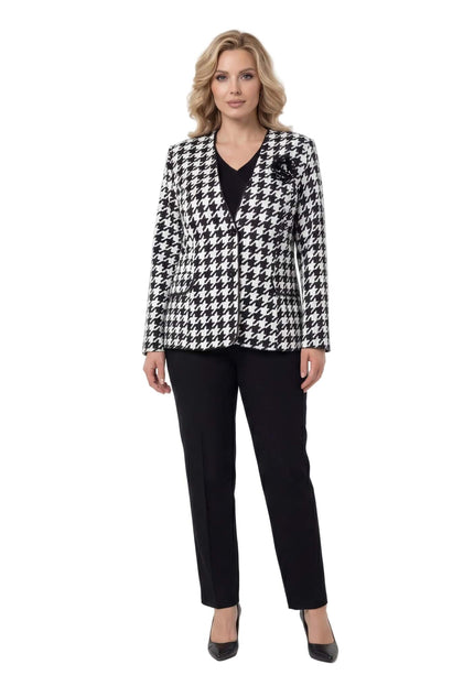 Елегантно дамско сако в десен пепит с декоративна роза и черен кант, представено върху модел в цял ръст.