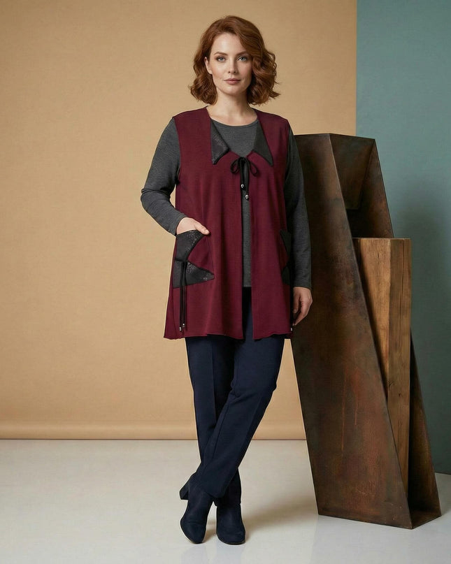 Разкроен макси елек в цвят бордо с детайли от еко кожа и връзки, позиран в цял ръст.