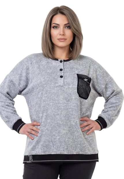 Светлосива дамска туника меланж с декоративен джоб и мрежа, заснета отпред. Моделът показва свободна кройка с копчета на деколтето и черни кантове на ръкавите.